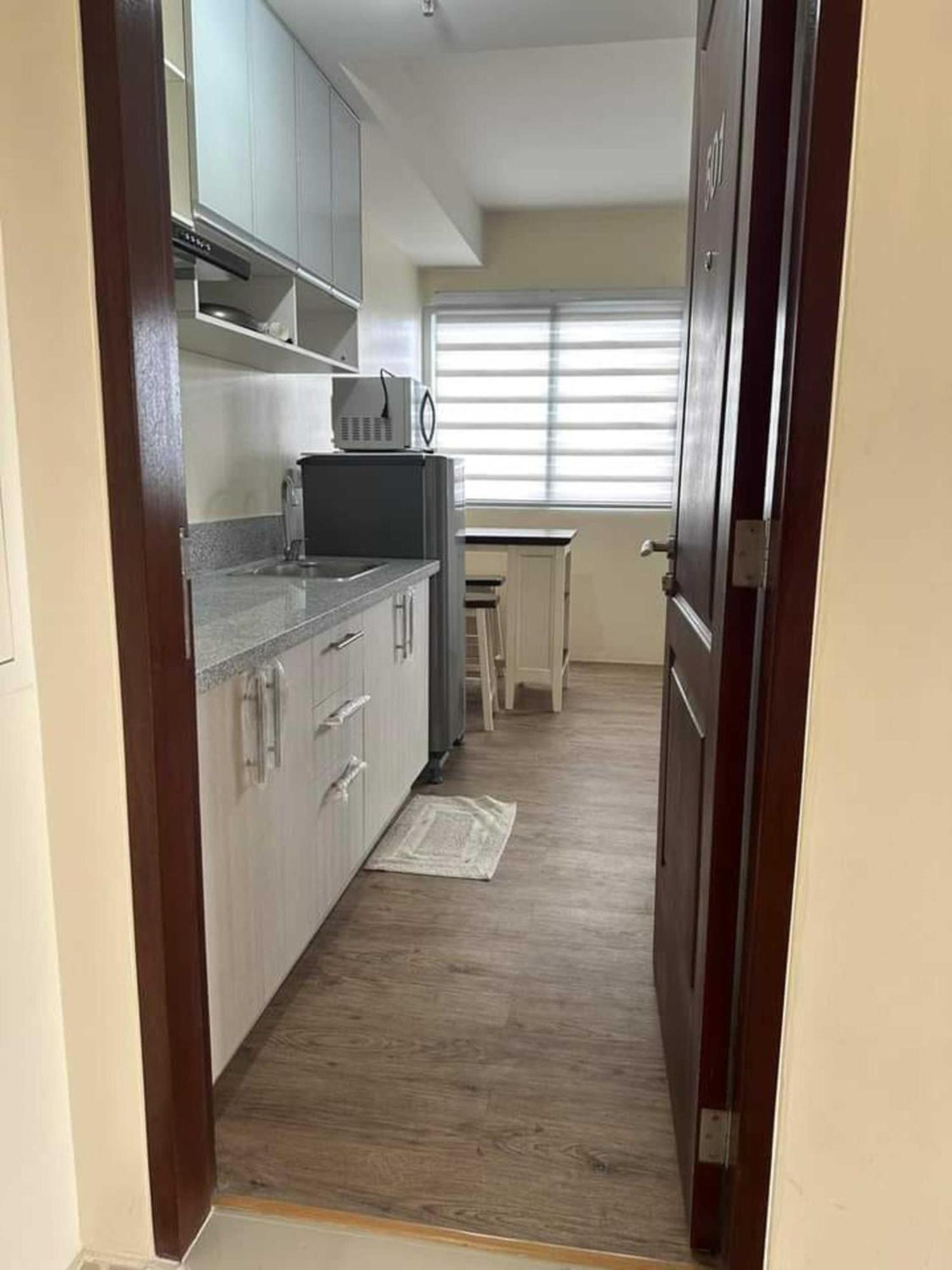Fullerton Suites Puting Kahoy Экстерьер фото