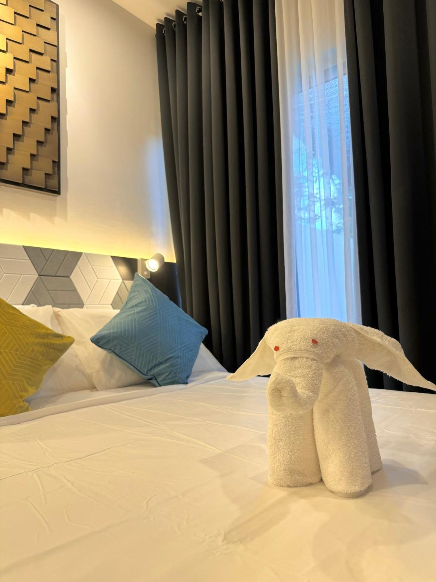 Fullerton Suites Puting Kahoy Экстерьер фото